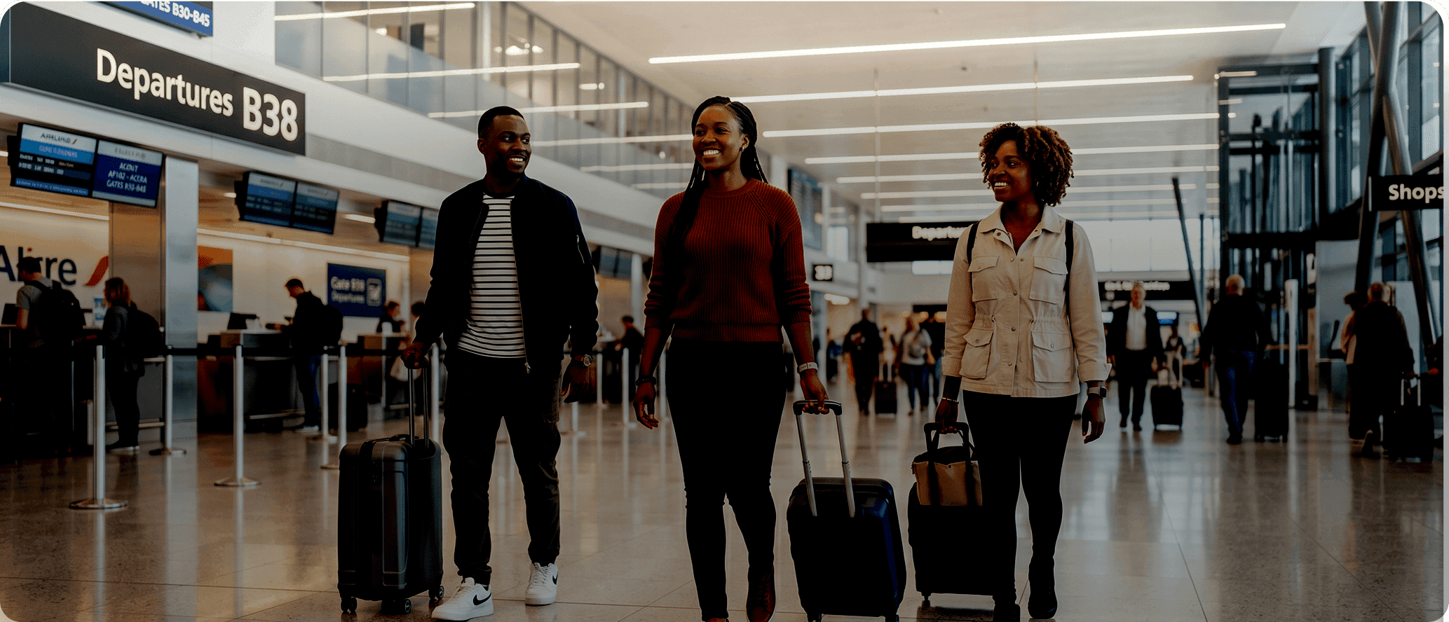 People walking through airport departures
